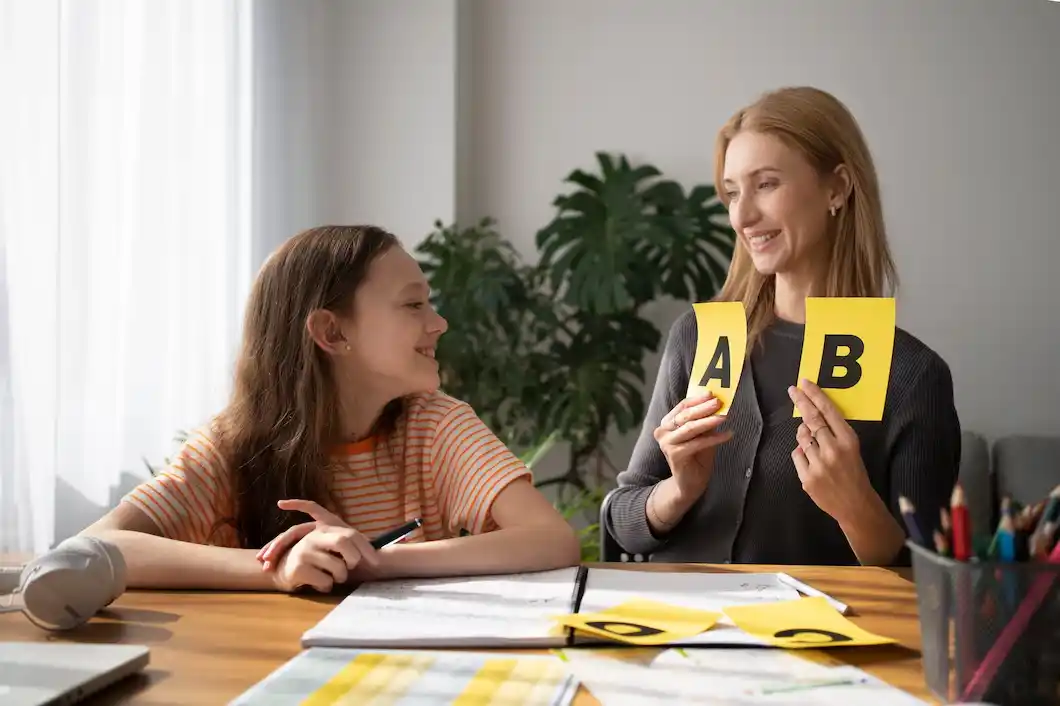 A woman holds yellow cards labeled