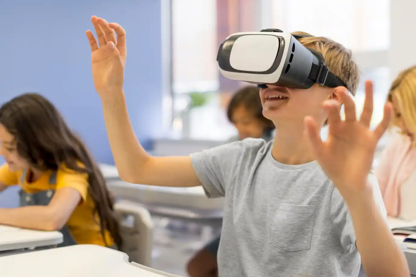 Boy with virtual reality headset at school