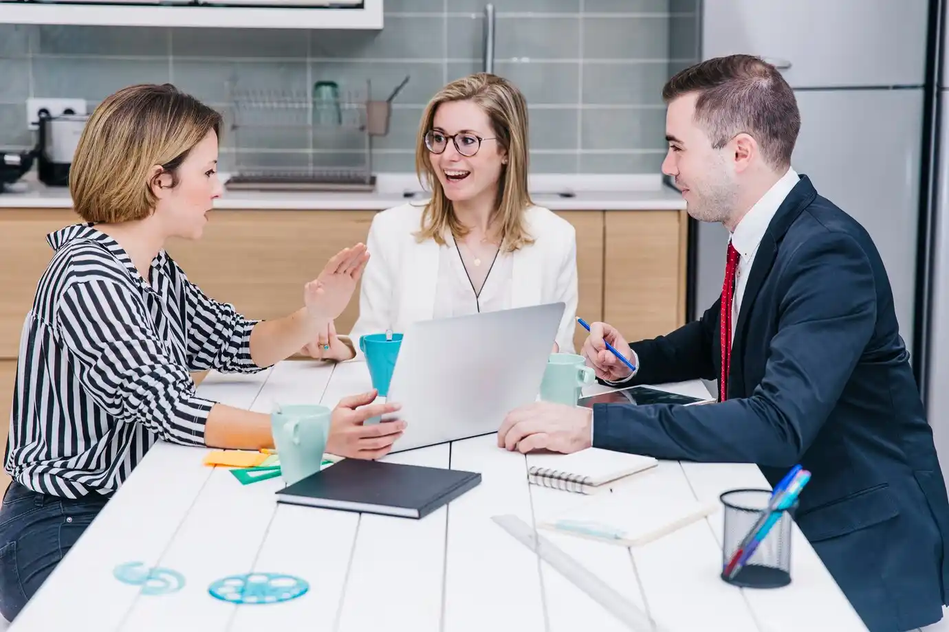 business professionals engaged in discussion at a table