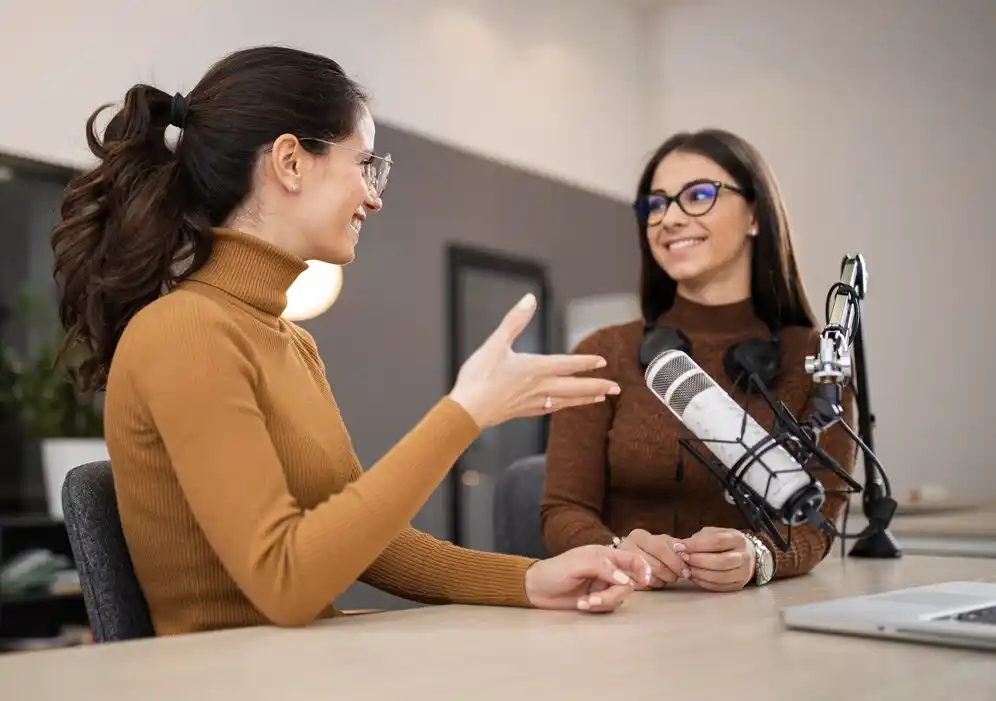 A highlighting a podcast or interview setting in a modern workspace.