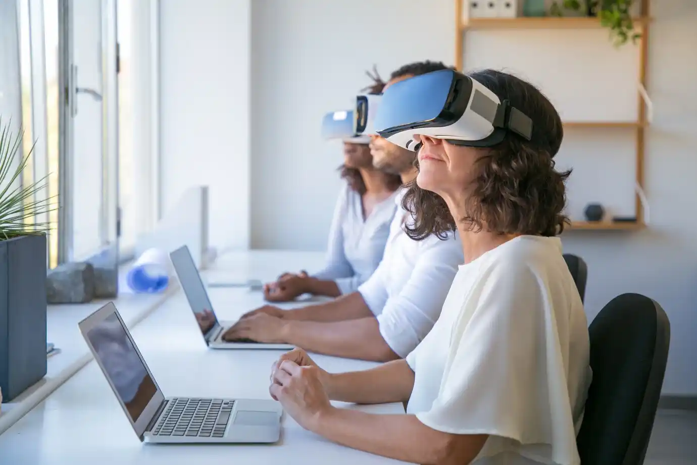 individuals wearing virtual reality headsets